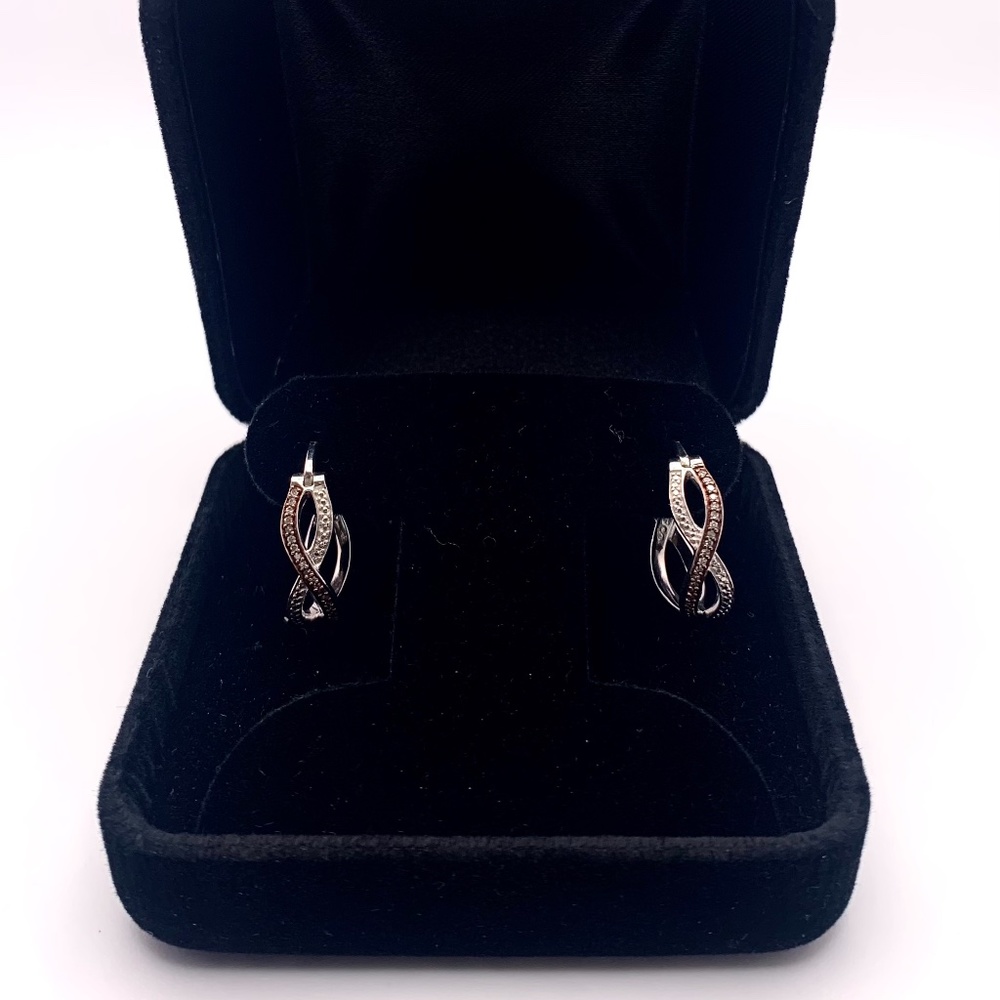 Rhodium two-tone swirl hoop earrings 1/8 tcw